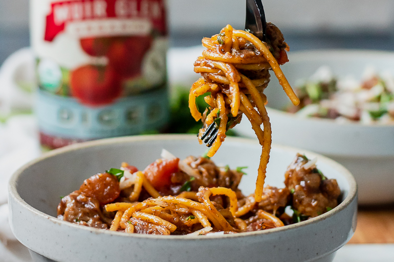 One Pot Wine Infused Bucatini with Sausage and Fire Roasted Tomatoes